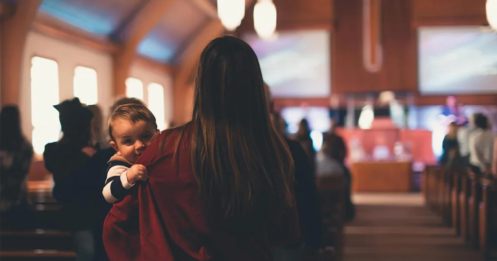 woman with child in church