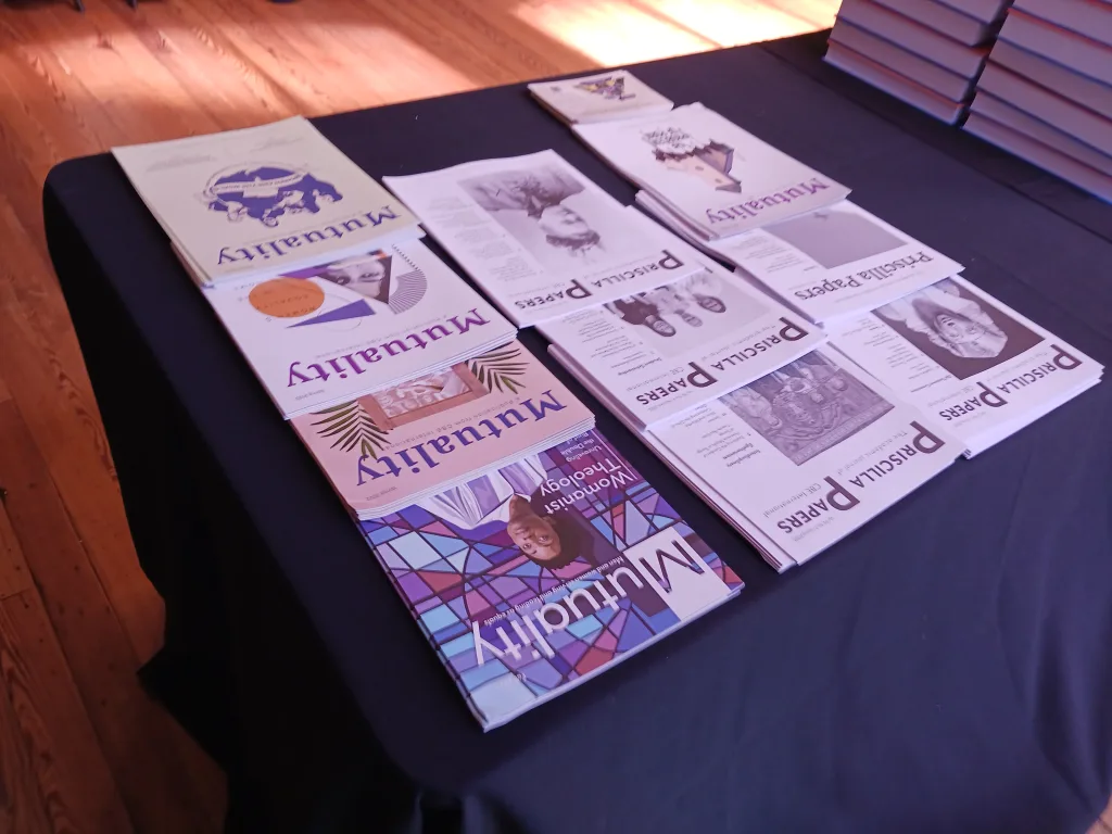 Priscilla Papers and Mutuality copies sitting on table