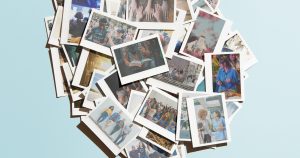 A bird's eye view of a stack of photos. The photos show church members together in community.